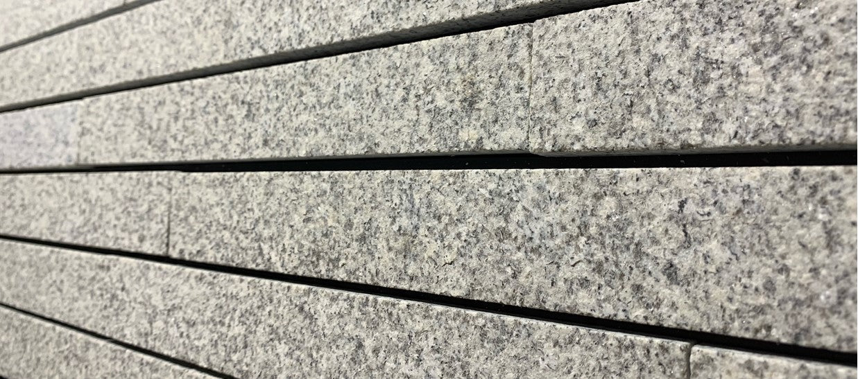 Kaprun natuursteenstrips wit